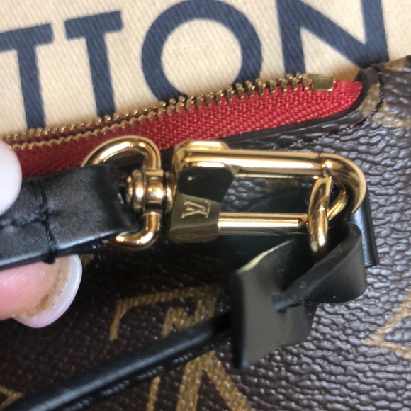 LV wristlet from World Tour collection. Authentic